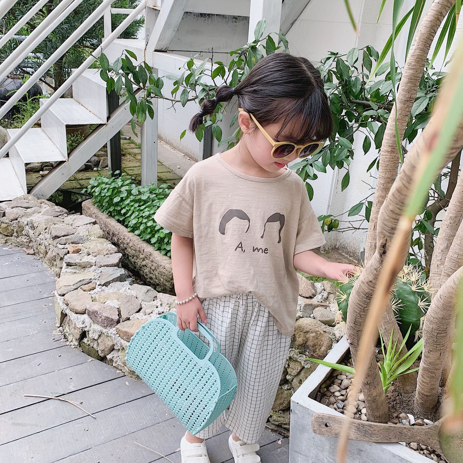 Black striped white checkered cropped pants