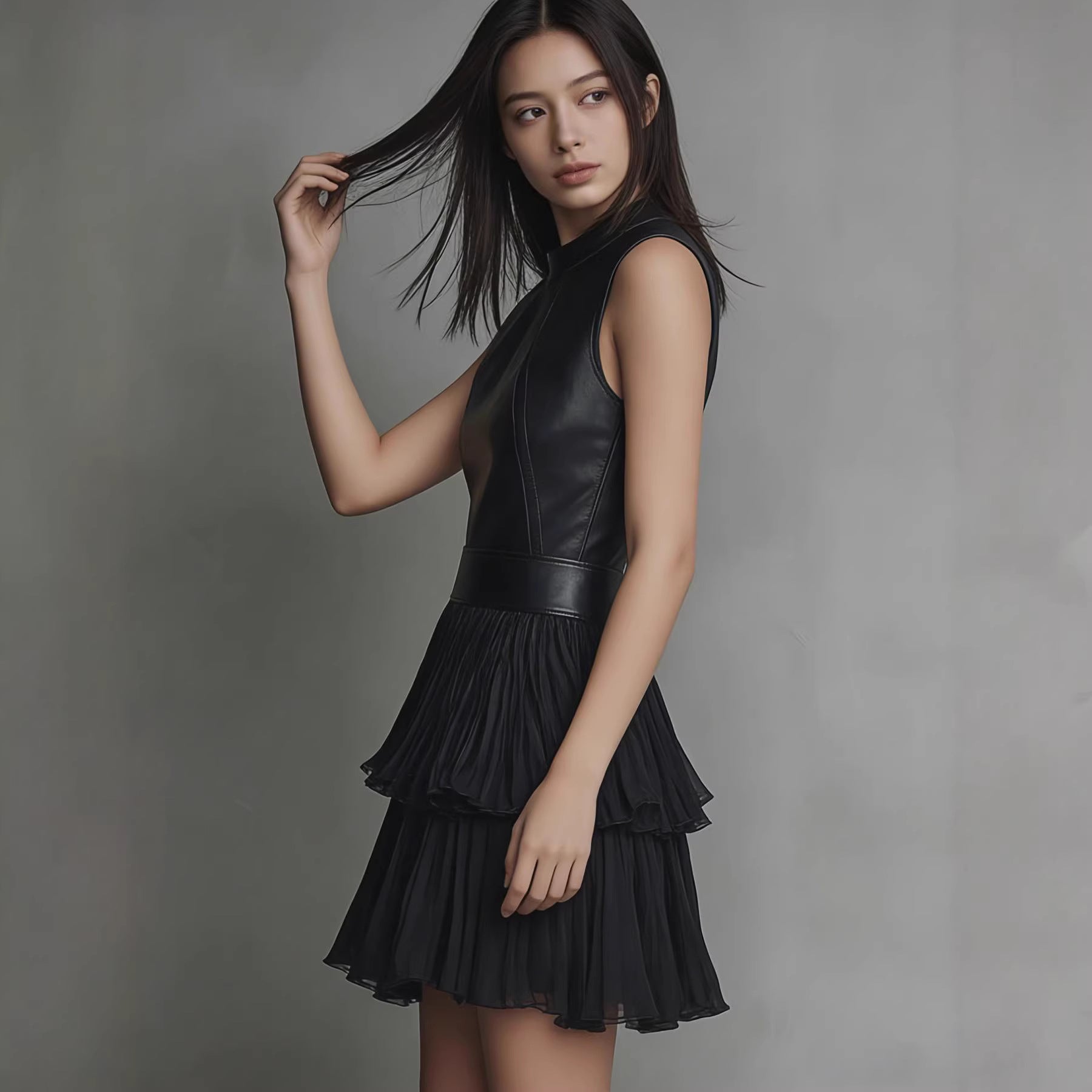 New short dress, sexy sleeveless PU leather spliced dress, elegant double-layer pleated ruffle hem skirt