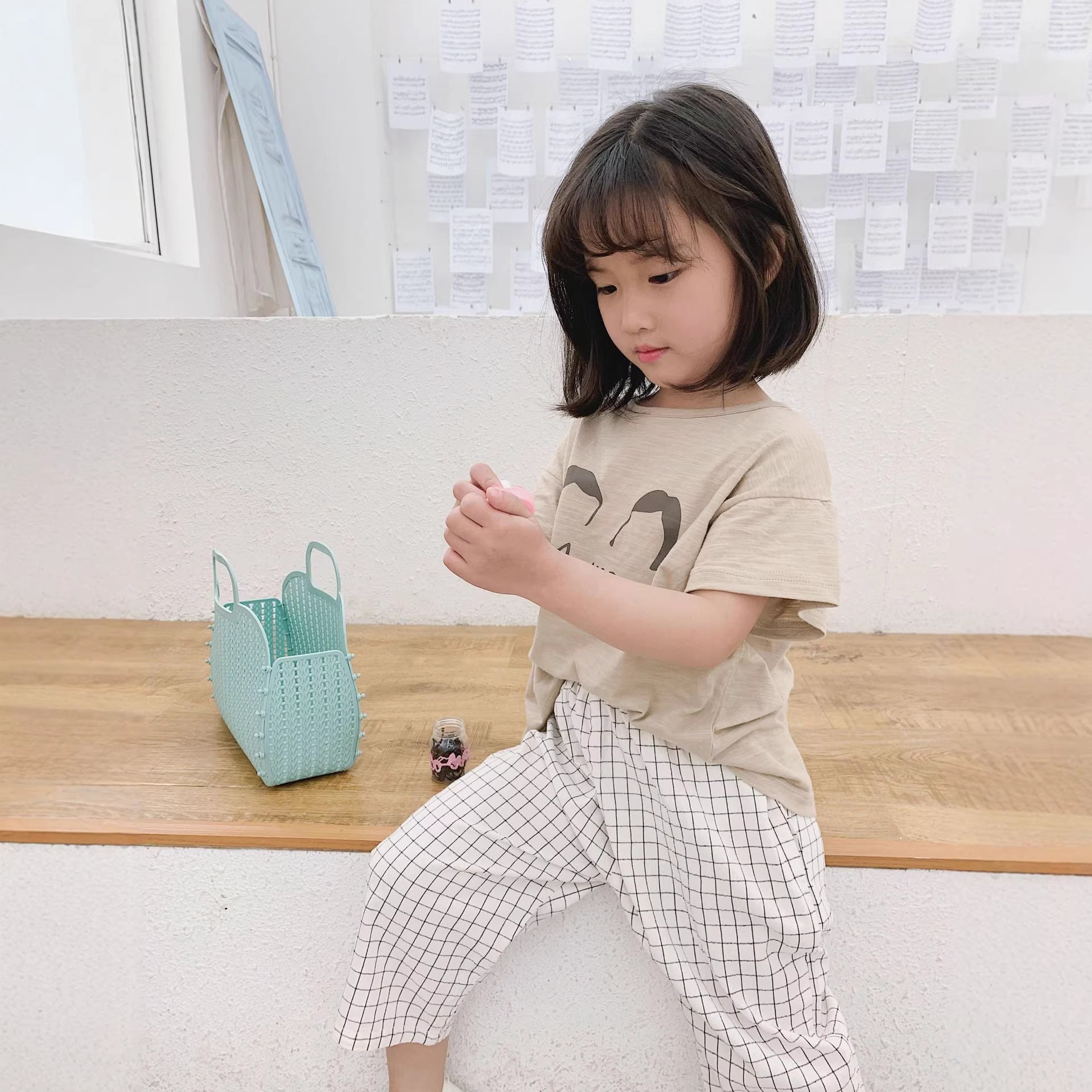 Black striped white checkered cropped pants