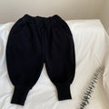 Knitted drawstring pants with external stitching